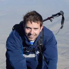 Doug hiking with a trekking pole